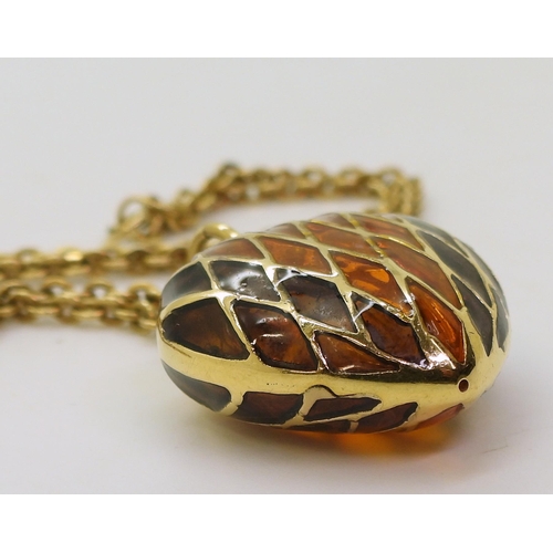 777 - An 18ct gold plique a jour style heart shaped pendant, with an 18ct gold 39cm chain (clasp 9ct) weig... 