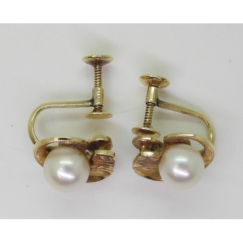 785 - A pair of 14k gold Mikimoto pearl earrings with screw backs, weight 4.1gms