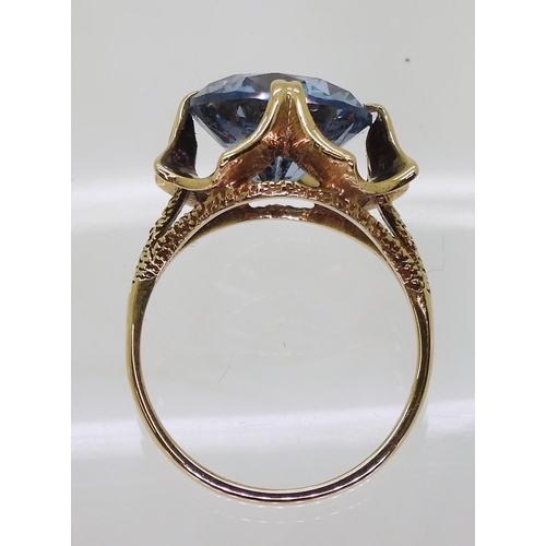 791 - A 9ct gold retro ring set with a blue glass gem, hallmarked 1971, size O1/2, weight 4.5gms