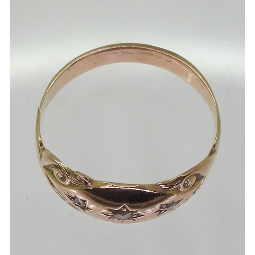 793 - A 9ct rose gold three rose cut diamond ring, size O, weight 2.3gms