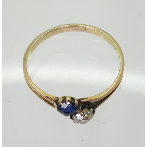 802 - A yellow metal sapphire and old cut diamond twin stone ring, size R1/2, weight 1.8gms, and set with ... 