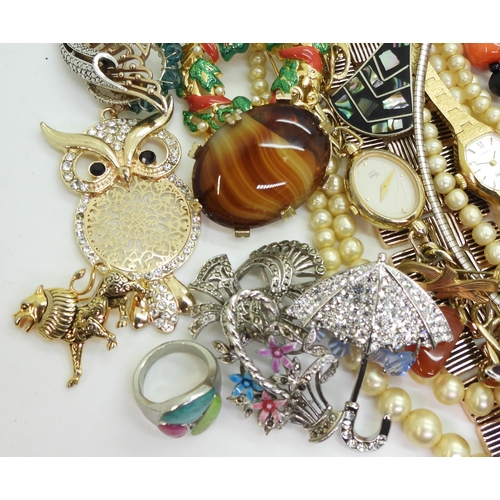 877 - A collection of costume jewellery, including two poodle brooches, a luckenbooth brooch, a pink gem C... 