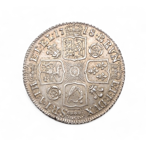 2571B - GEORGE I (1714-1727) 1 SHILLING 1718ObverseFirst laureate and draped bust of King George I right, le... 