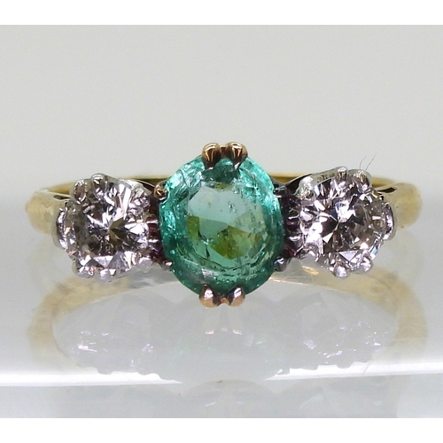 2776 - AN EMERALD & DIAMOND RINGset with a cushion cut emerald of approx 6.5mm x 5.5mm x 3.3mm, and set... 