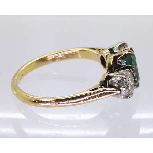 2776 - AN EMERALD & DIAMOND RINGset with a cushion cut emerald of approx 6.5mm x 5.5mm x 3.3mm, and set... 