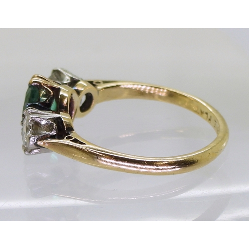 2776 - AN EMERALD & DIAMOND RINGset with a cushion cut emerald of approx 6.5mm x 5.5mm x 3.3mm, and set... 