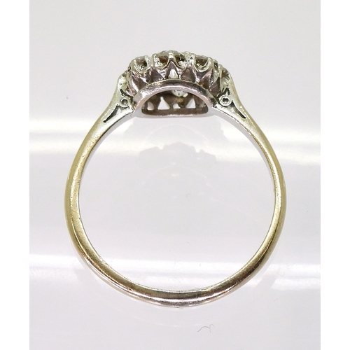 2777 - A DIAMOND FLOWER RINGthe classic galleried mount is set with estimated approx 0.80cts of brilliant c... 