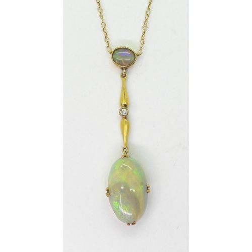 2778 - AN OPAL AND WHITE SAPPHIRE NECKLACEmounted in 9ct gold and set with an oval cabochon opal of approx ... 