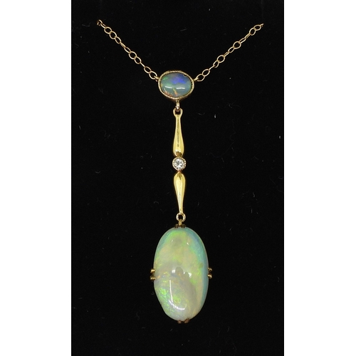 2778 - AN OPAL AND WHITE SAPPHIRE NECKLACEmounted in 9ct gold and set with an oval cabochon opal of approx ... 