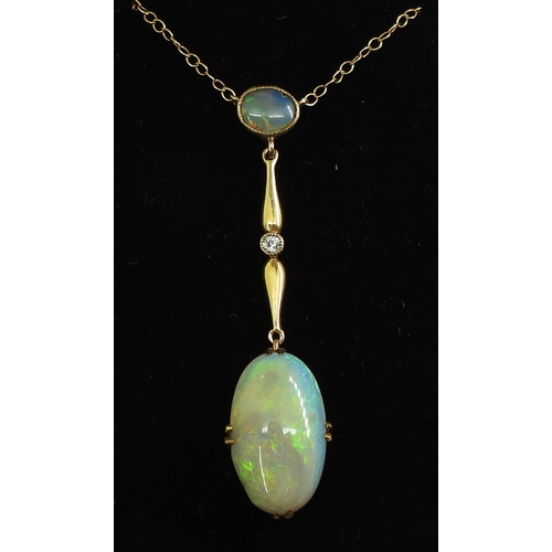 2778 - AN OPAL AND WHITE SAPPHIRE NECKLACEmounted in 9ct gold and set with an oval cabochon opal of approx ... 