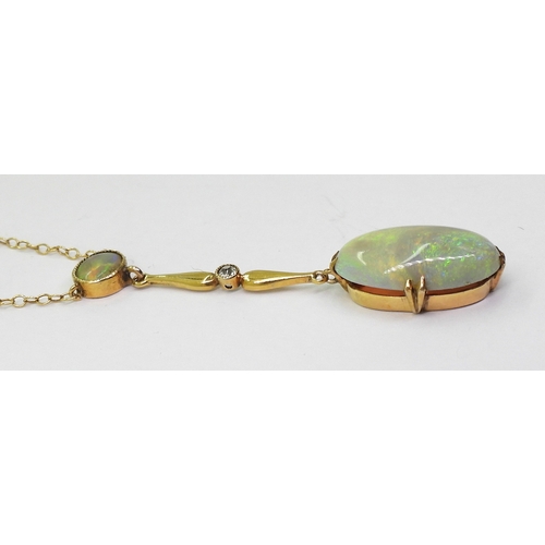 2778 - AN OPAL AND WHITE SAPPHIRE NECKLACEmounted in 9ct gold and set with an oval cabochon opal of approx ... 