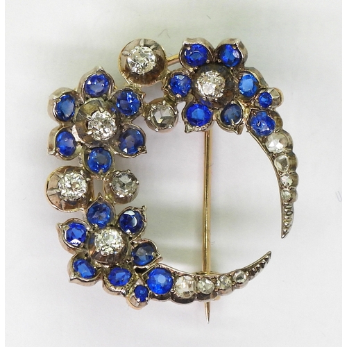 2780 - A FLOWER CRESCENT MOON BROOCHset with old and rose cut diamonds, with an estimated approx total diam... 