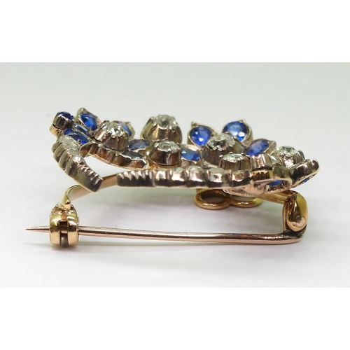 2780 - A FLOWER CRESCENT MOON BROOCHset with old and rose cut diamonds, with an estimated approx total diam... 