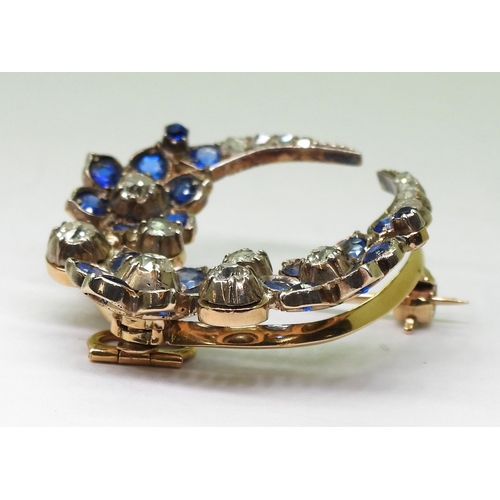 2780 - A FLOWER CRESCENT MOON BROOCHset with old and rose cut diamonds, with an estimated approx total diam... 