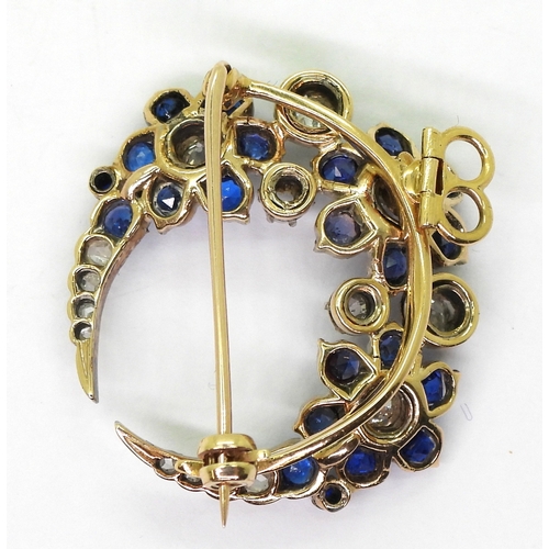 2780 - A FLOWER CRESCENT MOON BROOCHset with old and rose cut diamonds, with an estimated approx total diam... 