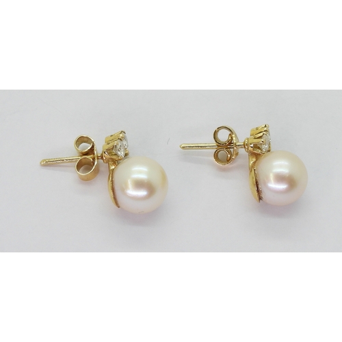 2781 - PEARL & DIAMOND EARRINGSmounted in 18ct yellow gold with post and butterfly fitting, each earrin... 