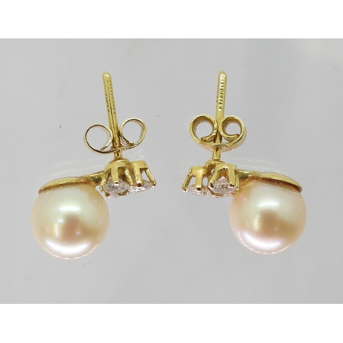 2781 - PEARL & DIAMOND EARRINGSmounted in 18ct yellow gold with post and butterfly fitting, each earrin... 