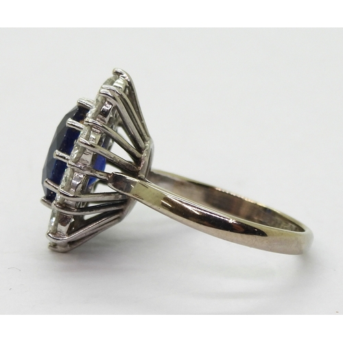 2786 - A CLASSIC SAPPHIRE & DIAMOND CLUSTER RINGthe mount in 18ct white gold and platinum, is set with ... 