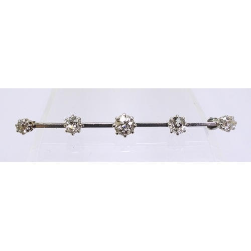 2788 - A FIVE STONE DIAMOND BAR BROOCHset with five old cut diamonds with an estimated approx diamond total... 