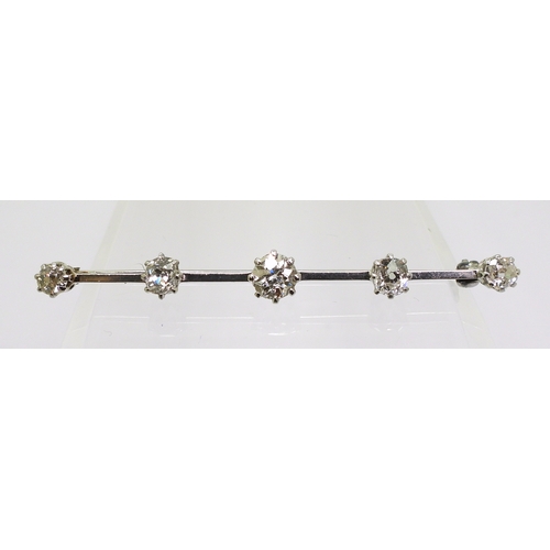 2788 - A FIVE STONE DIAMOND BAR BROOCHset with five old cut diamonds with an estimated approx diamond total... 