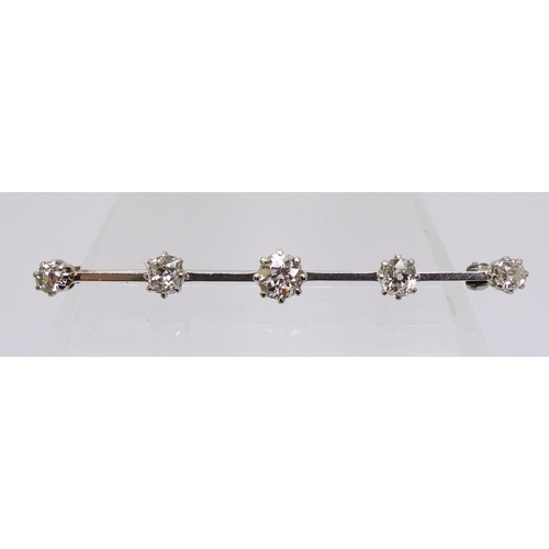 2788 - A FIVE STONE DIAMOND BAR BROOCHset with five old cut diamonds with an estimated approx diamond total... 