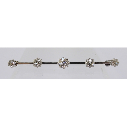 2788 - A FIVE STONE DIAMOND BAR BROOCHset with five old cut diamonds with an estimated approx diamond total... 