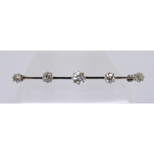 2788 - A FIVE STONE DIAMOND BAR BROOCHset with five old cut diamonds with an estimated approx diamond total... 