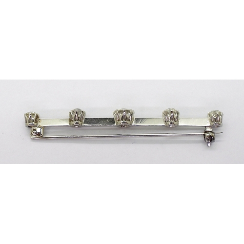 2788 - A FIVE STONE DIAMOND BAR BROOCHset with five old cut diamonds with an estimated approx diamond total... 