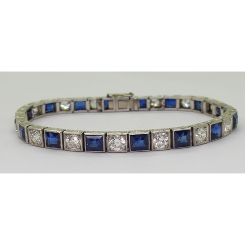 2791 - A SAPPHIRE & DIAMOND LINE BRACELETgently tapering in size from 4.3mm x 4.7mm x 3.1mm to 3.4mm x ... 