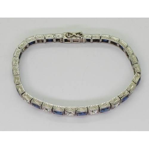 2791 - A SAPPHIRE & DIAMOND LINE BRACELETgently tapering in size from 4.3mm x 4.7mm x 3.1mm to 3.4mm x ... 