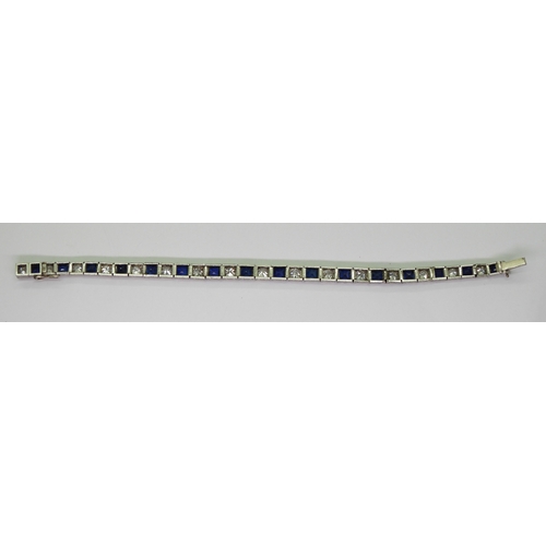 2791 - A SAPPHIRE & DIAMOND LINE BRACELETgently tapering in size from 4.3mm x 4.7mm x 3.1mm to 3.4mm x ... 