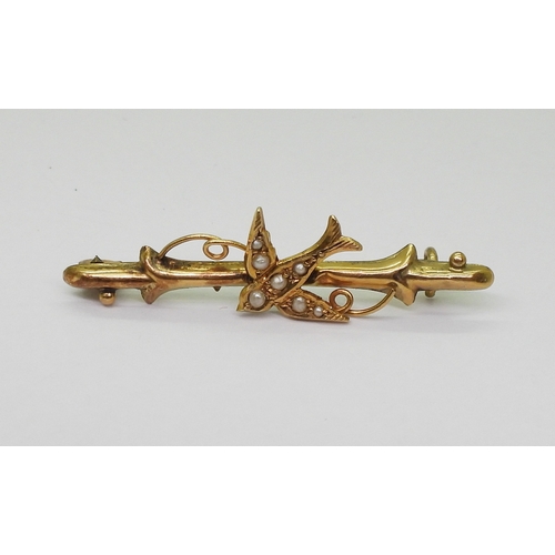 2795 - FOUR VINTAGE BROOCHESa bright yellow metal large bar brooch with a pearl studded dragonfly design, l... 