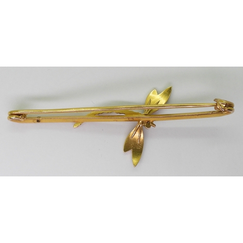 2795 - FOUR VINTAGE BROOCHESa bright yellow metal large bar brooch with a pearl studded dragonfly design, l... 