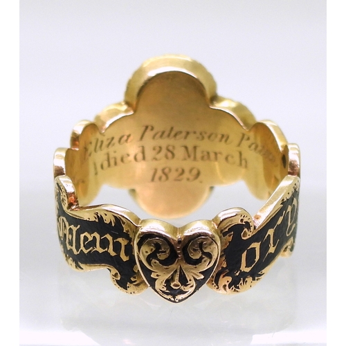 2798 - AN UNUSUAL MOURNING RINGwith bright yellow metal four lobed design. To the front with forget-me not ... 