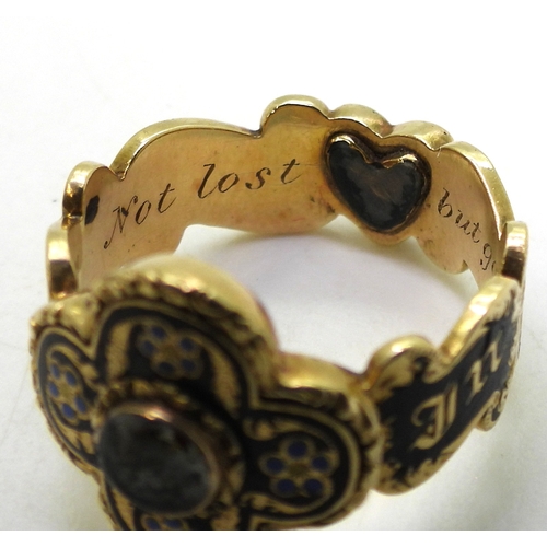 2798 - AN UNUSUAL MOURNING RINGwith bright yellow metal four lobed design. To the front with forget-me not ... 