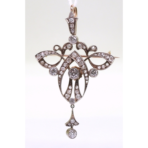 2816 - A DIAMOND EDWARDIAN PENDANTthe yellow and white metal mount is set with estimated approx 1.10cts of ... 