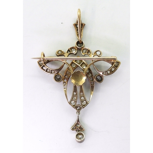 2816 - A DIAMOND EDWARDIAN PENDANTthe yellow and white metal mount is set with estimated approx 1.10cts of ... 