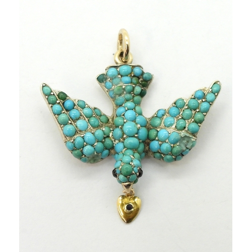 2817 - A TURQUOISE BIRD PENDANTthe yellow and white metal mount is set throughout with turquoise, with red ... 