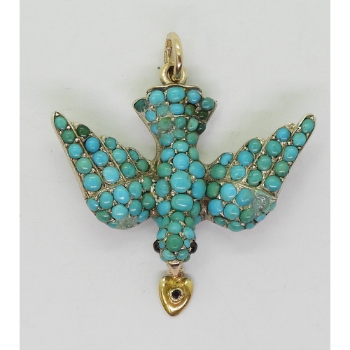 2817 - A TURQUOISE BIRD PENDANTthe yellow and white metal mount is set throughout with turquoise, with red ... 