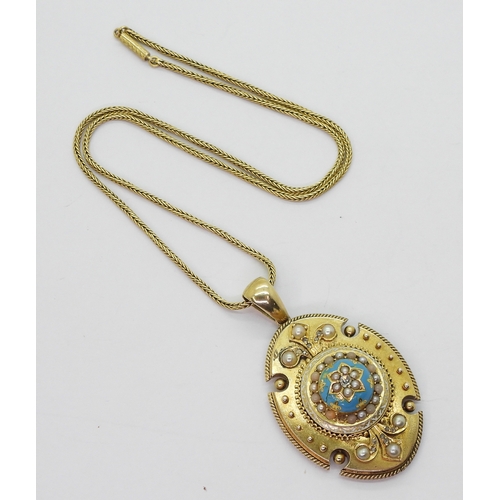 2819 - A VICTORIAN PENDANTthe locket back pendant in bright yellow metal, has turquoise and white enamel de... 