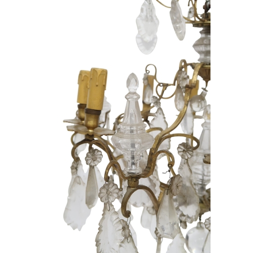 2058 - AN ARTS AND CRAFTS CHANDELIER with stylized brass ring with rectangular glass pendants, 61cm drop x ... 