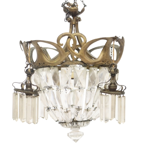 2058 - AN ARTS AND CRAFTS CHANDELIER with stylized brass ring with rectangular glass pendants, 61cm drop x ... 