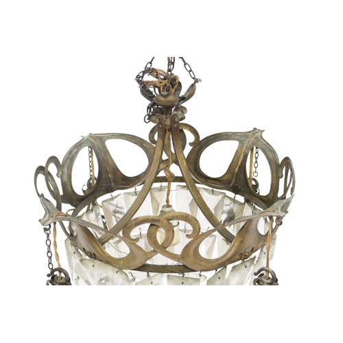 2058 - AN ARTS AND CRAFTS CHANDELIER with stylized brass ring with rectangular glass pendants, 61cm drop x ... 