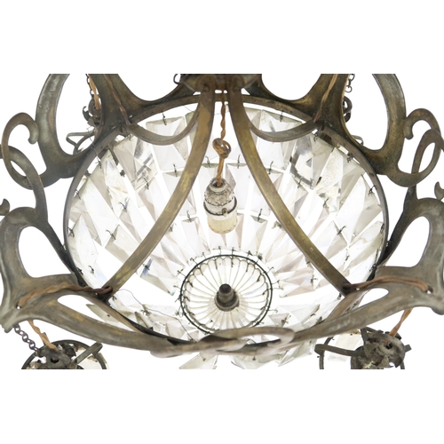 2058 - AN ARTS AND CRAFTS CHANDELIER with stylized brass ring with rectangular glass pendants, 61cm drop x ... 