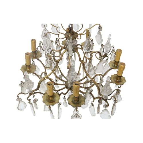 2058 - AN ARTS AND CRAFTS CHANDELIER with stylized brass ring with rectangular glass pendants, 61cm drop x ... 