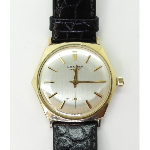 2887 - A 14K GOLD LONGINESwith unusual hexagonal shaped case, model name; World's Fair, silvered dial with ... 