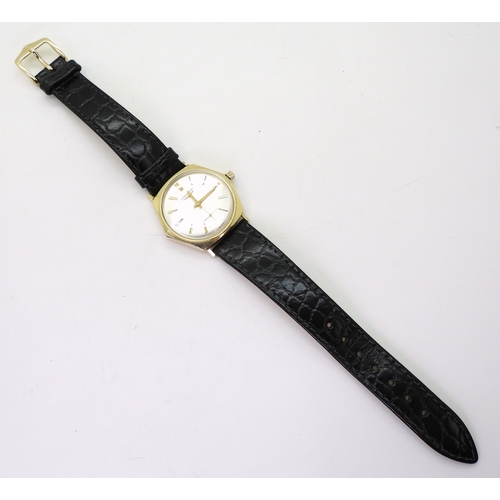 2887 - A 14K GOLD LONGINESwith unusual hexagonal shaped case, model name; World's Fair, silvered dial with ... 