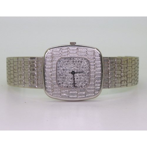 2893 - A RETRO DIAMOND SET PIAGETwith crocodile skin textured bezel and strap, the dial set with pave set d... 