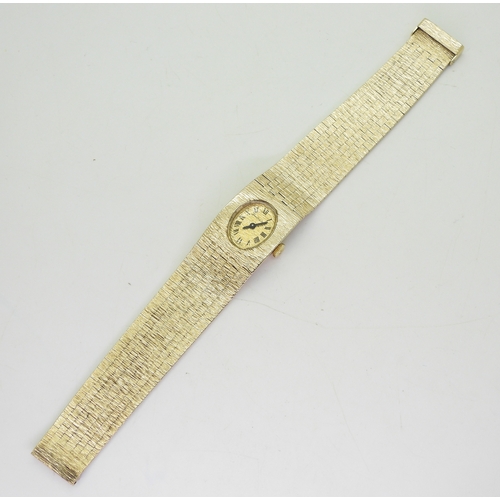 2894 - A 9CT BUECHE GIRODladies watch with retro integral bark textured strap, hallmarked London 1972, gold... 