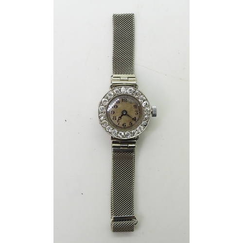 2896 - A VERTEX COCKTAIL WATCHwith a diamond bezel, set with estimated approx 0.70cts of old cut diamonds. ... 